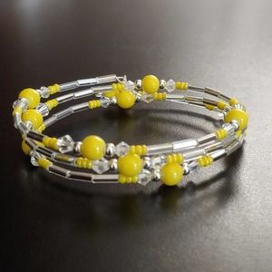 Yellow and silver beaded oval memory wire bracelet